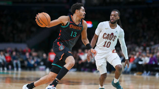 Feb 25, 2024; Washington, District of Columbia, USA; Washington Wizards guard Jordan Poole (13) drives to there basket as Cleveland Cavaliers guard Darius Garland (10) defends during the second half at Capital One Arena. Mandatory Credit: Tommy Gilligan-USA TODAY Sports